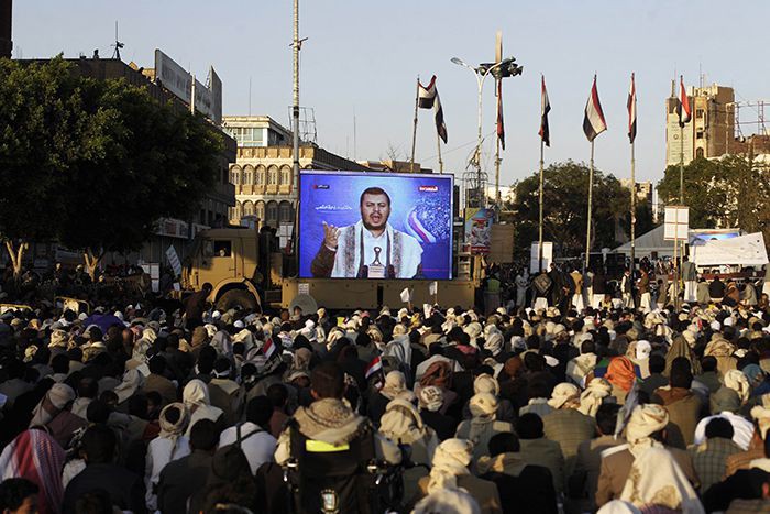 Shi'ite Houthi rebels watch a televised speech by their leader Abdul Malik al-Houthi in Sanaa