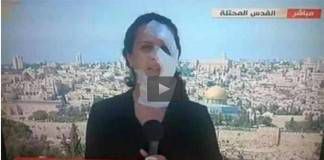 นักข่าวหญิง รายงานข่าวการก่ออาชญากรรมของอิสราเอล ในสภาพที่ใบหน้ามีบาดแผลจากการถูกโจมตี